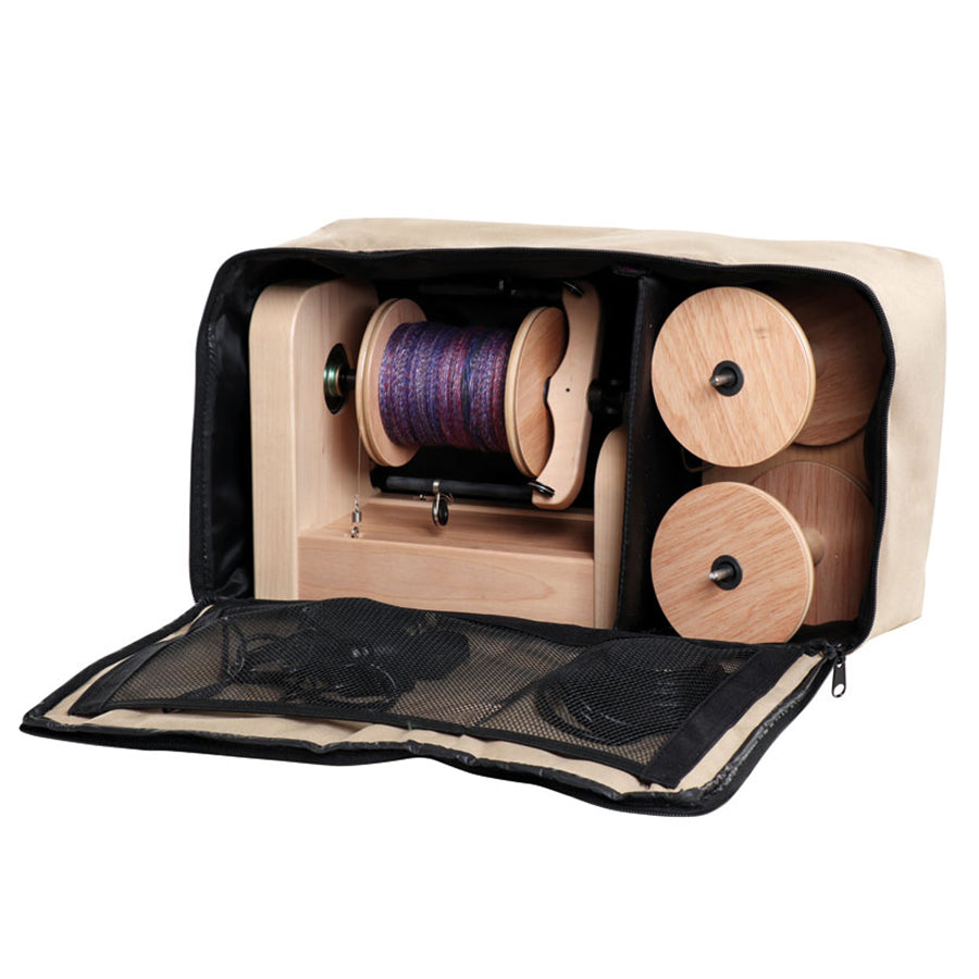 Picture of the Ashford e-spinner + 2 bobbins packed into the carrying case.