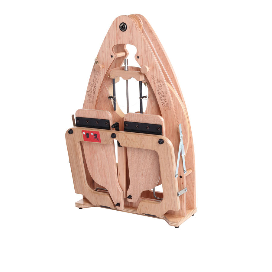 Picture of the Ashford Joy spinning wheel with the treadles folded up.
