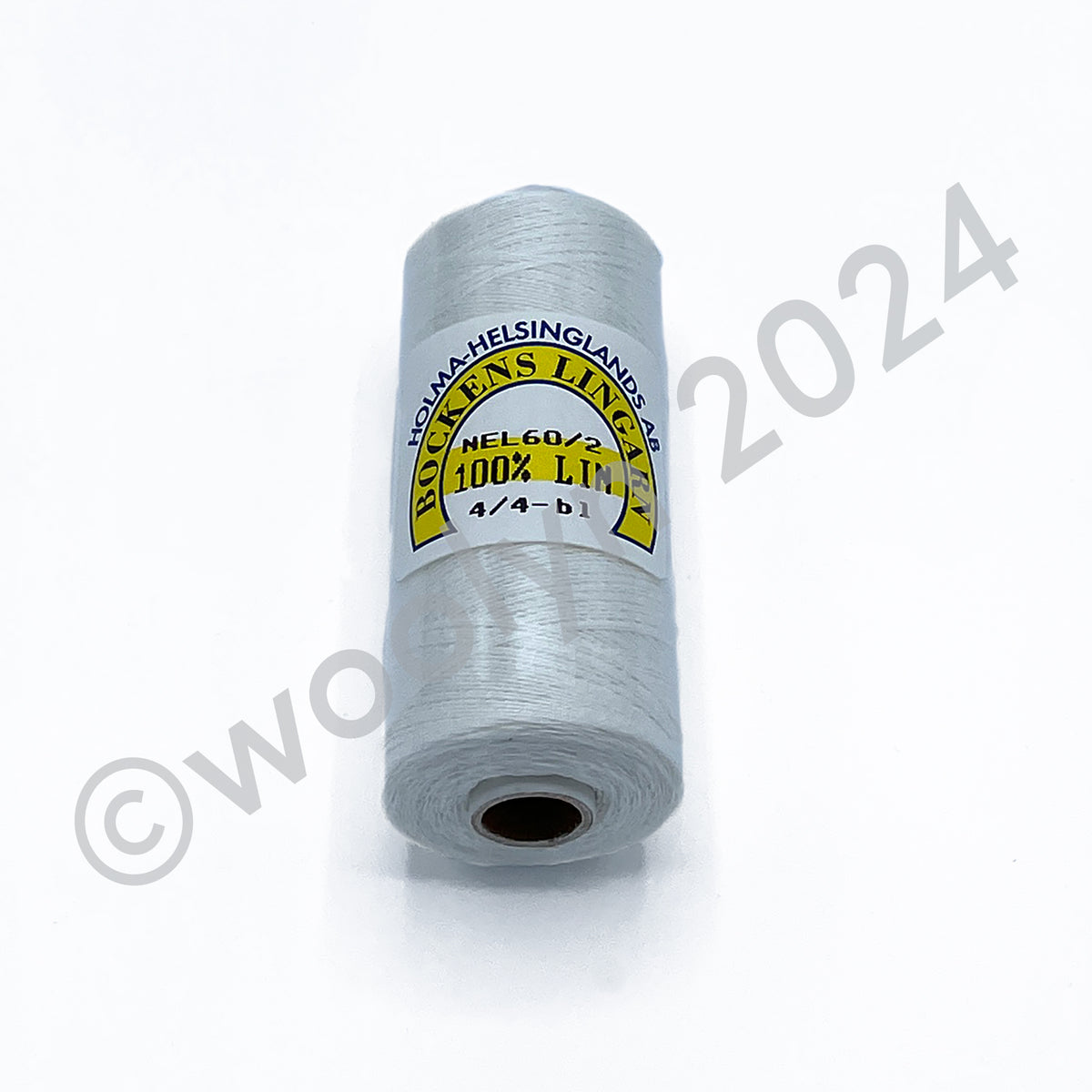 A 25g spool of Bockens Bobbin Lace Thread in bleached white.