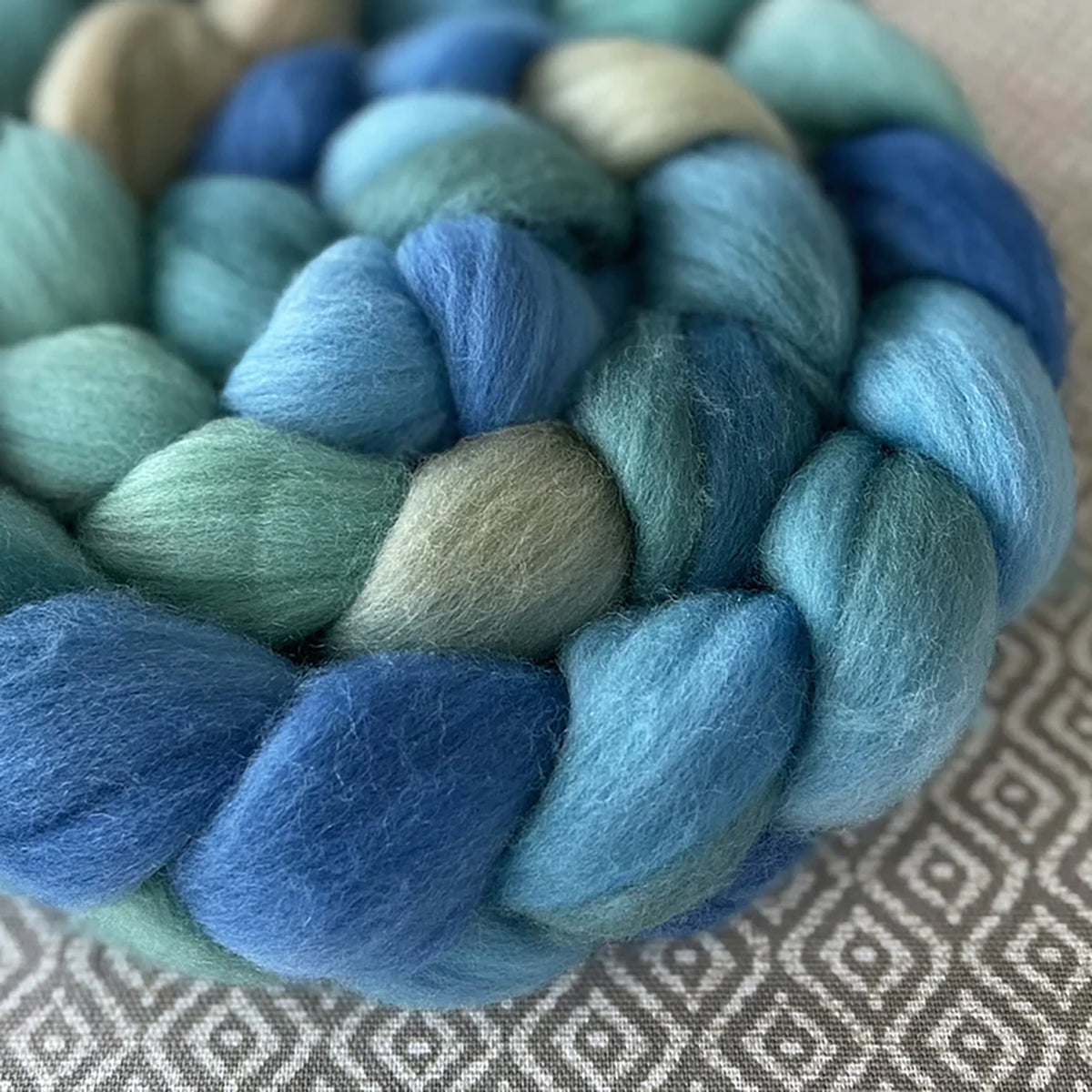 Detail of Greenwood Fiberworks Pigtails in Aquamarine, in pale blues and greens