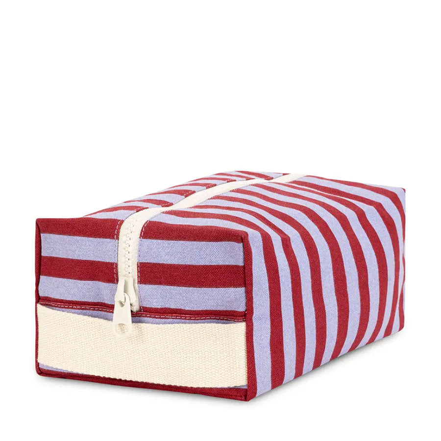 Rectangular fabric pouch with red and purple stripes and a zipper closure