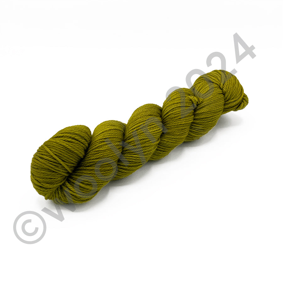 Skein of Tesserae Kissa in Dirty Martini, a yellowish mossy green color