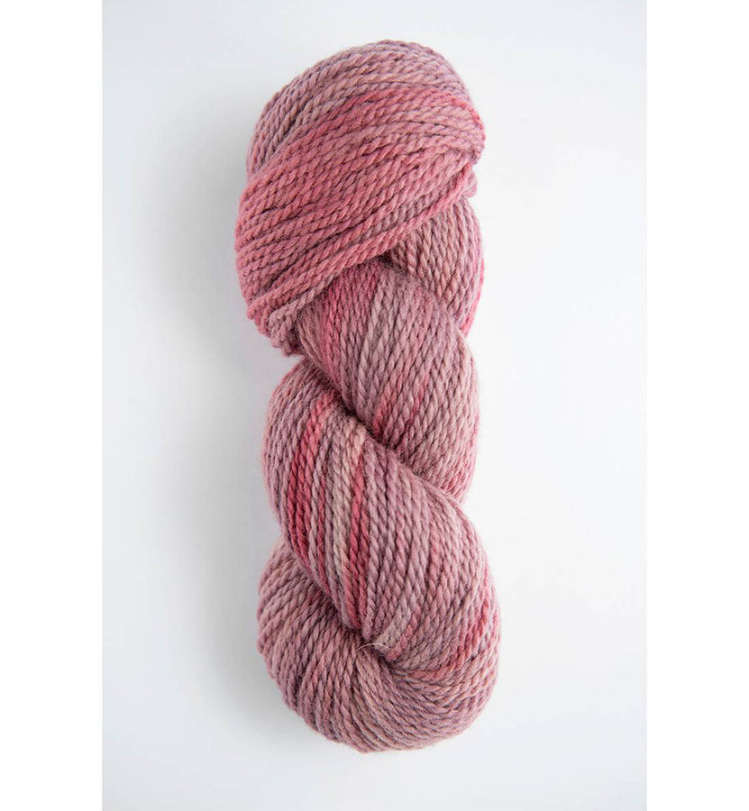 A skein of Amano Riti Gorge in variegated earthy pastel pinks 