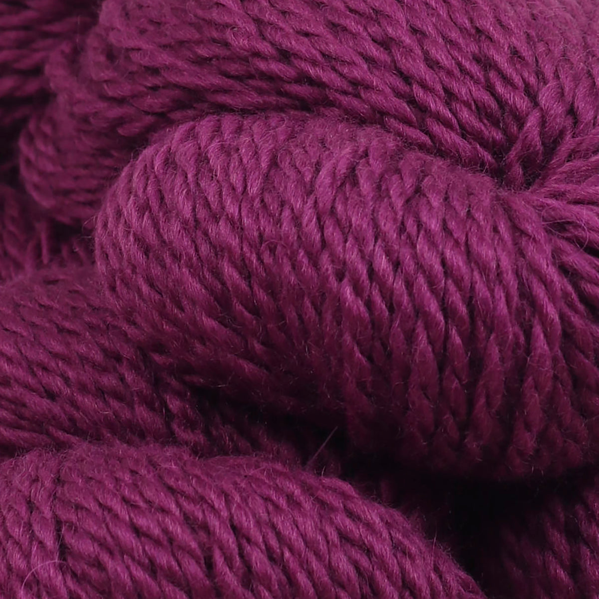 Detail of The Fibre Co. Tundra Lingonberry, a deep magenta purple