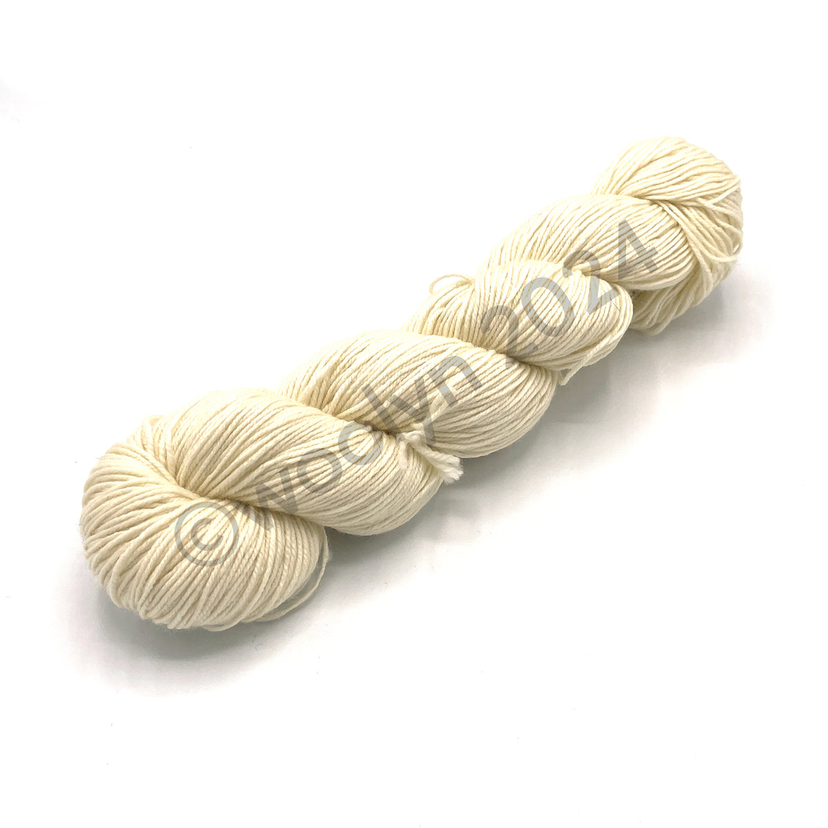 A Skein of Knitted Wit DK Naked, a natural off-white color