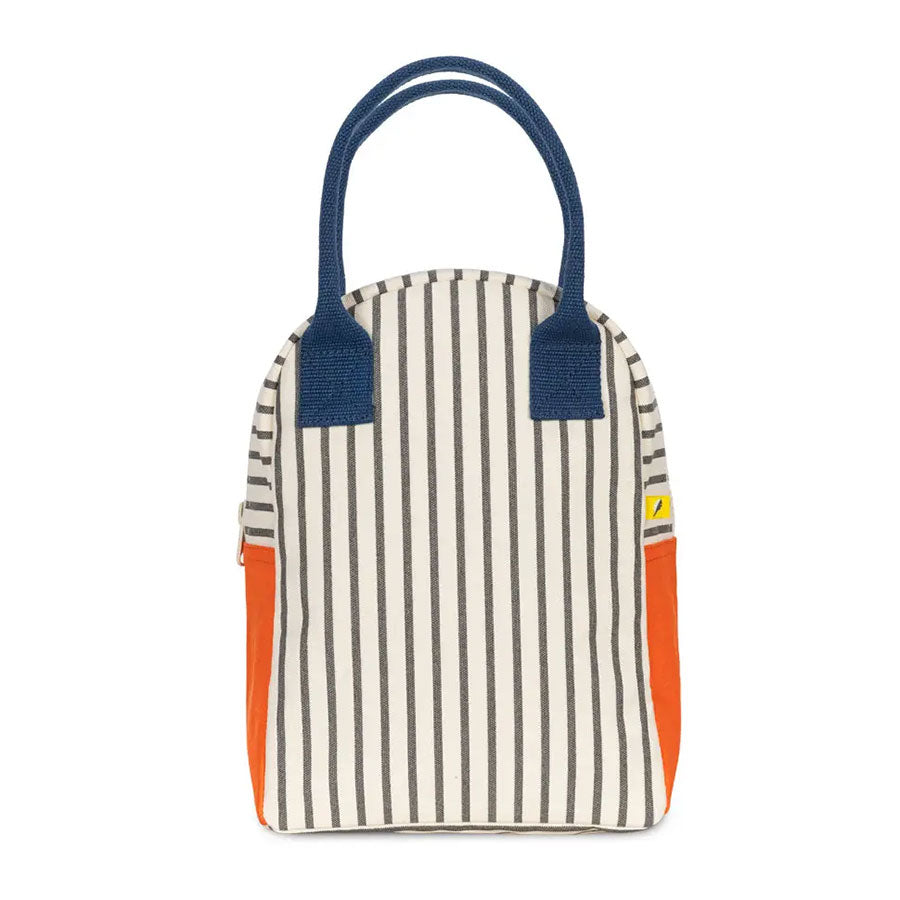 Black and white striped bag with orange accents and blue handles and a zipper closure on a white background