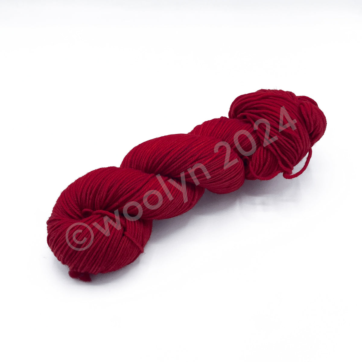 A Skein of Knitted Wit DK in Red