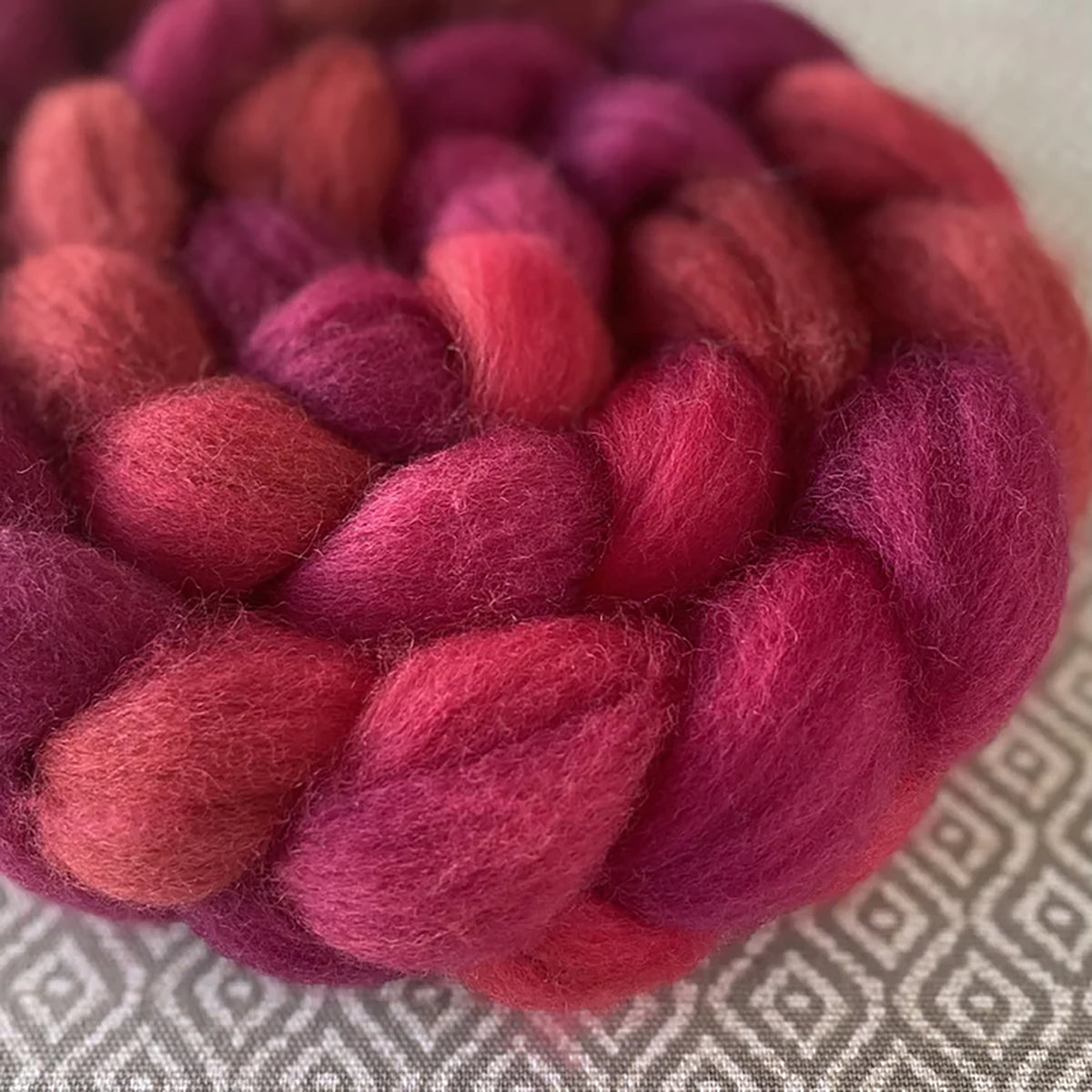 Detail of Greenwood Fiberworks Pigtails Ruby in a tonal magenta color