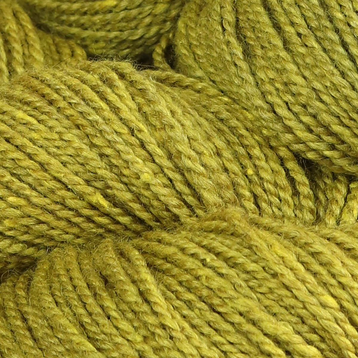 Detail of The Fibre Co. Acadia Yellow Birch, a lime green color