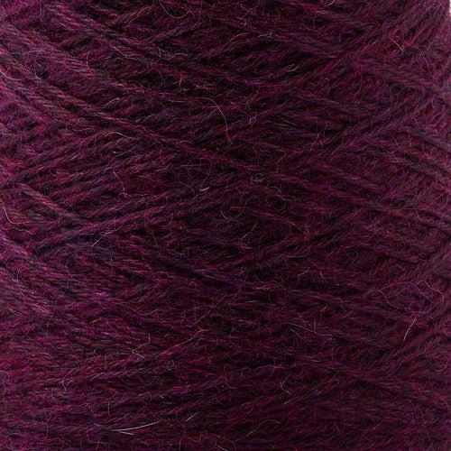 Detail of Gist Yarn Ode Boysenberry, a dark berry purple. 