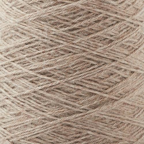 Detail of Gist Yarn Ode Fawn, a light camel color. 