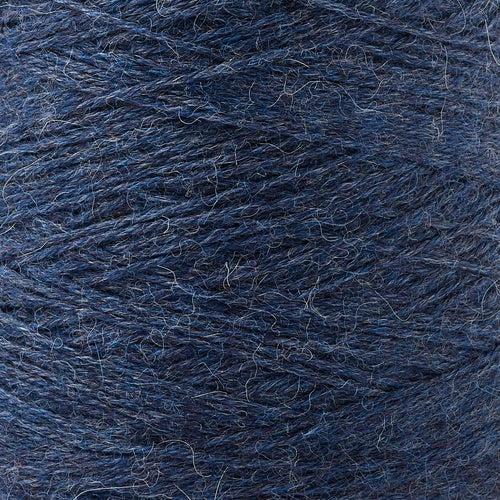 Detail of Gist Yarn Ode Obsidian, a deep, dark heathered blue. 
