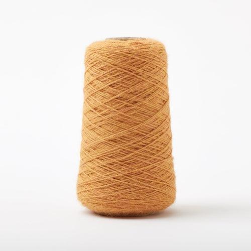 Cone of Gist Ode in Sunflower, a hue of golden yellow.