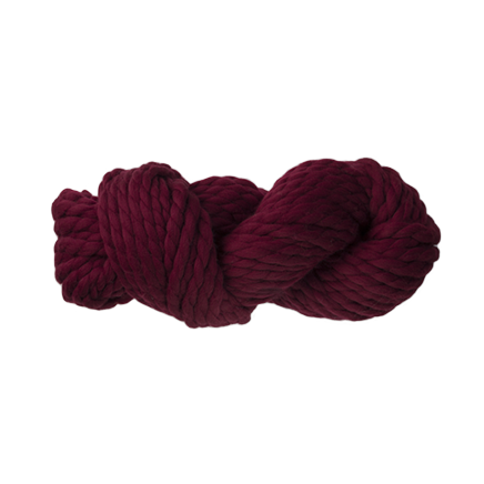 Amano Yana XL Berry Crush a Cranberry colored yarn twisted in a skein.