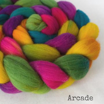 Detail of Greenwood Fiberworks Targhee Arcade in a rainbow of neon colors: green, pink, purple, yellow and blue.