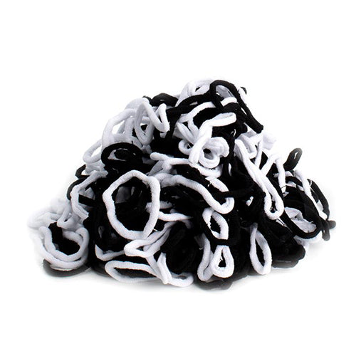 A picture of a pile of potholder loops in black and white colors. Additional loops for the 7" potholder loom.  Each bag contains enough loops for 2 potholders.