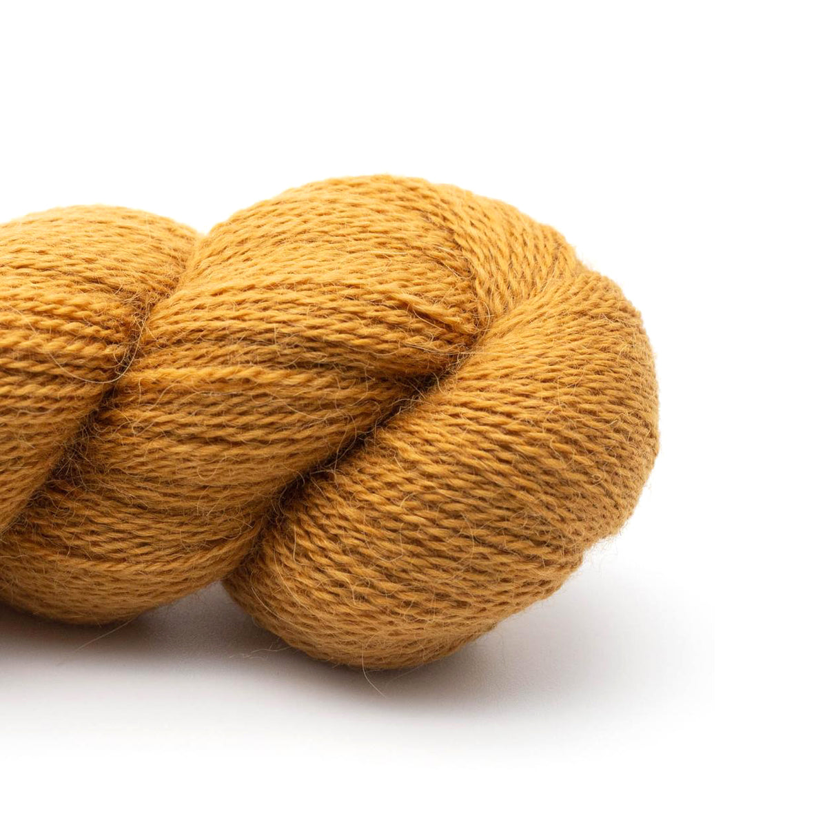 Detail of Kremke Baby Alpaca Lace in Curry, an earthy yellow color