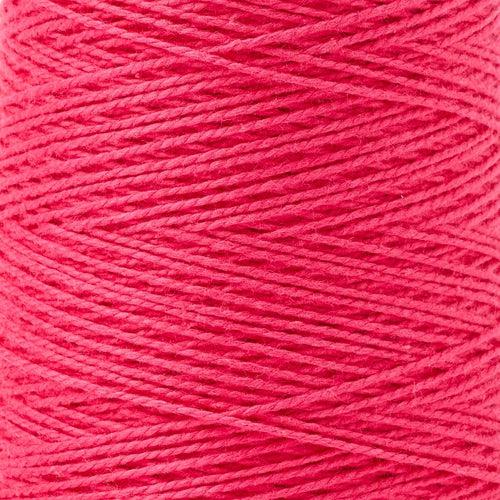 detail of Gist Yarn 3/2 Cotton in Hibiscus, a medium melon pink. 