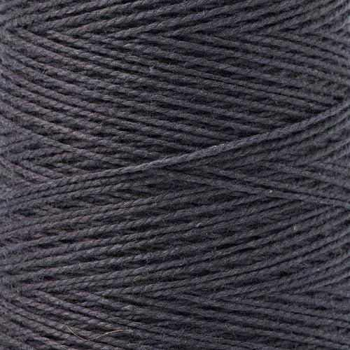 detail of Gist Yarn 3/2 Cotton in Licorice, a warm, purply black. 