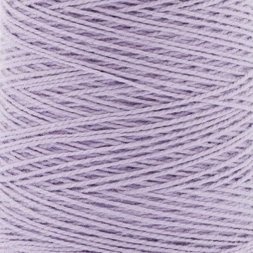 detail of Gist Yarn 3/2 Cotton in Lilac, a pale shade of purple. 