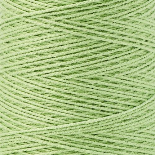 detail of Gist Yarn 3/2 Cotton in Pistachio, a light, spring green. 
