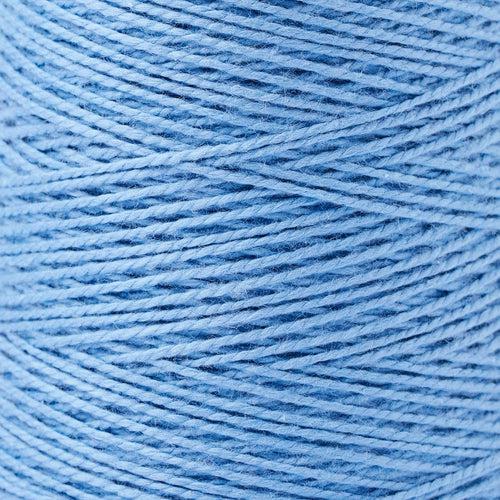detail of Gist Yarn 3/2 Cotton in Pacific, a bright periwinkle blue. 