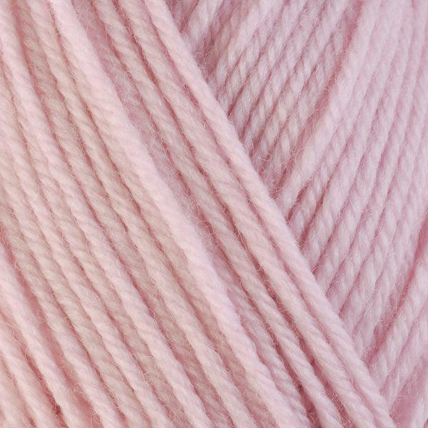 Detail of Berroco Ultra Wool Chunky Alyssum 4310 a pale bubblegum pink.