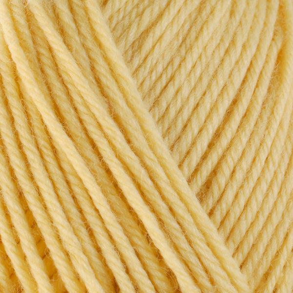 Detail of Berroco Ultra Wool Chunky Butter 4312 a pale yellow. 