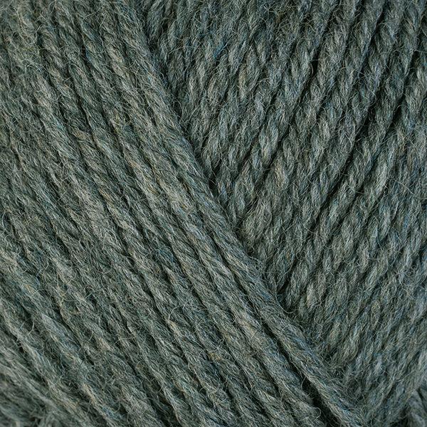 Detail of Berroco Ultra Wool Chunky Spruce 43125 a heathered dark green.