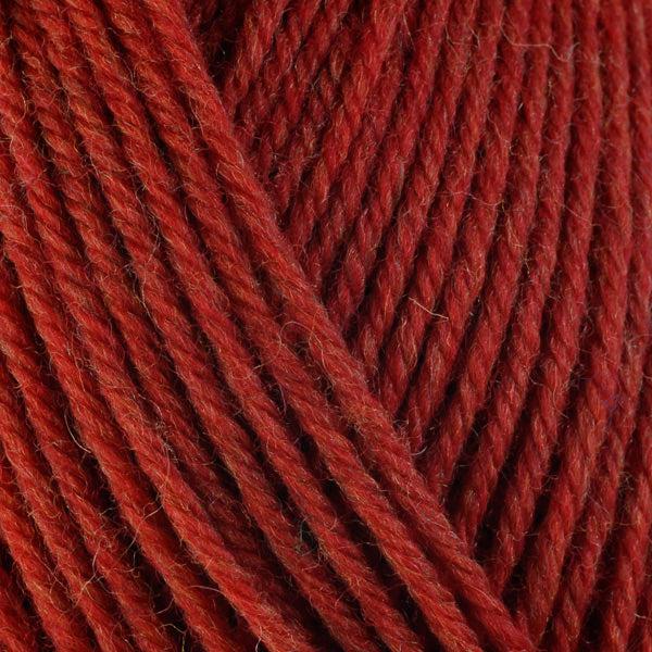Detail of Berroco Ultra Wool Chunky Sunflower 43122 a medium red. 