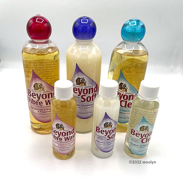 Bottles of Unicorn Beyond Fibre Wash, Beyond Clean and Beyond Soft in  4 oz and 16 oz.