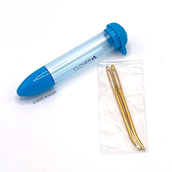 Chibi needle case in blue and large bent tapestry needles.