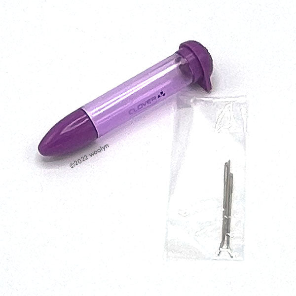 Chibi needle case in purple and small bent tip darning needles.