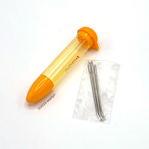 Chibi needle case in Yellow and medium bent tip tapestry needles.