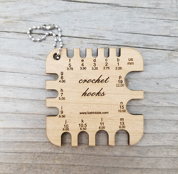 Katrinkles Square Crochet Hook Gauge US B-P with a ball chain.