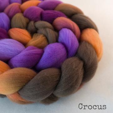 Detail of Greenwood Fiberworks Targhee Crocus in both muted and vibrant purple, browns apricot and lavender.