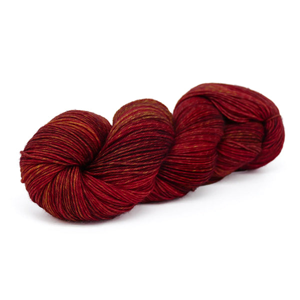 Laneras Deseos Cupid with many shades of red to make a deep tonal yarn. 