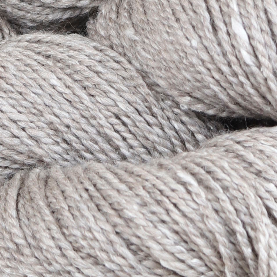 Detail image of The Fibre Co Acadia in Driftwood a heathered light grey.