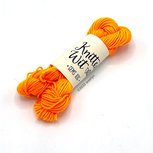 Knitted Wit Gems Habanero a bright  orange color.