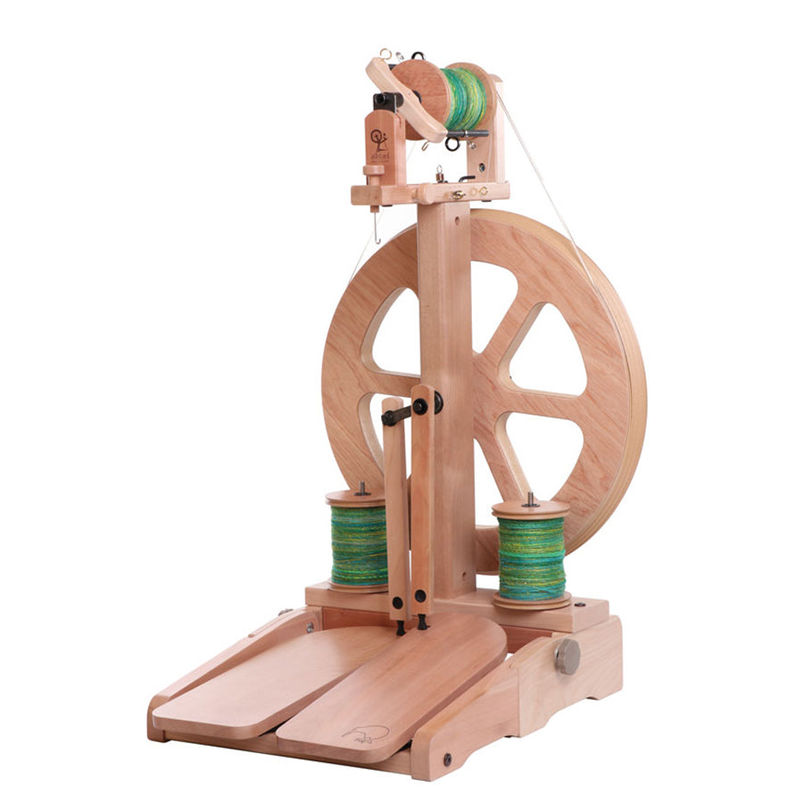 Angled front view of the Ashford Kiwi spinning wheel.  