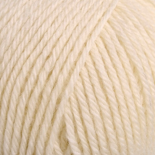 Closeup of Berroco Lanas Buttercream 9502 in a darker cream white