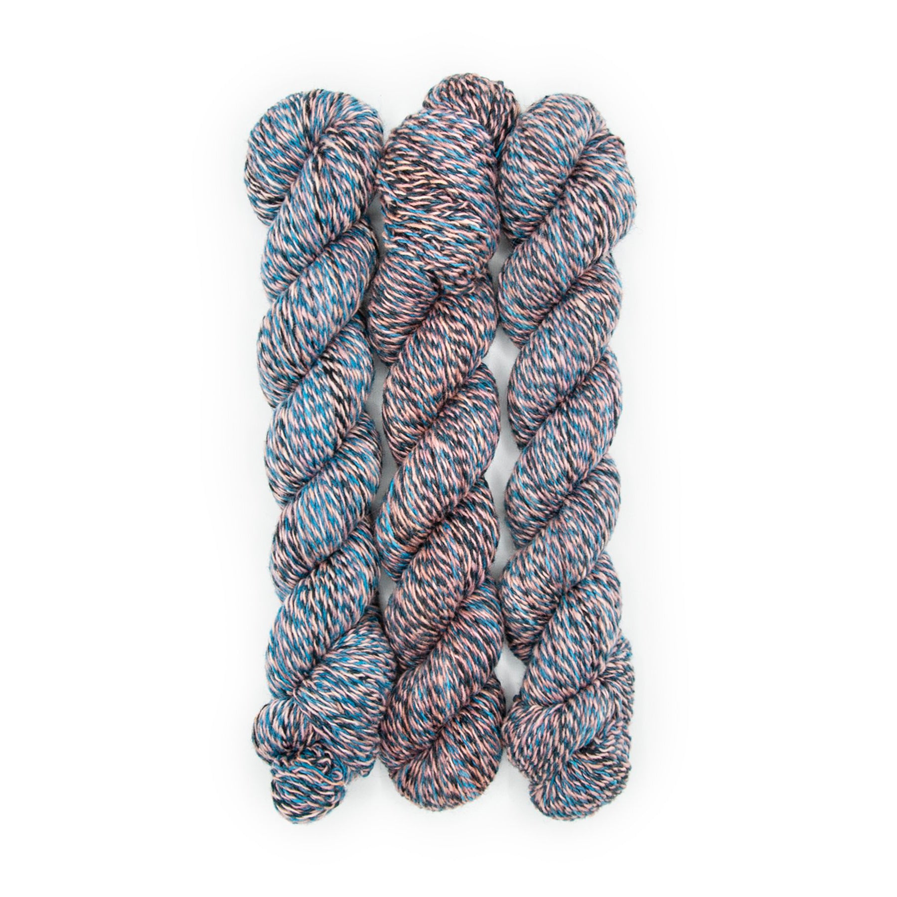 Plied Yarn North Ave Mister a marled yarn with salmon pink, turquoise and dark grey colors.