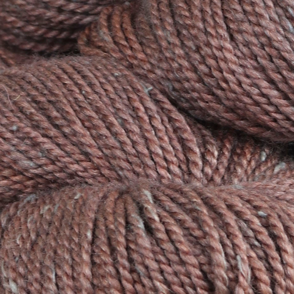 Detail image of The Fibre Co Acadia in Moraine, an earthy brown with light blue.