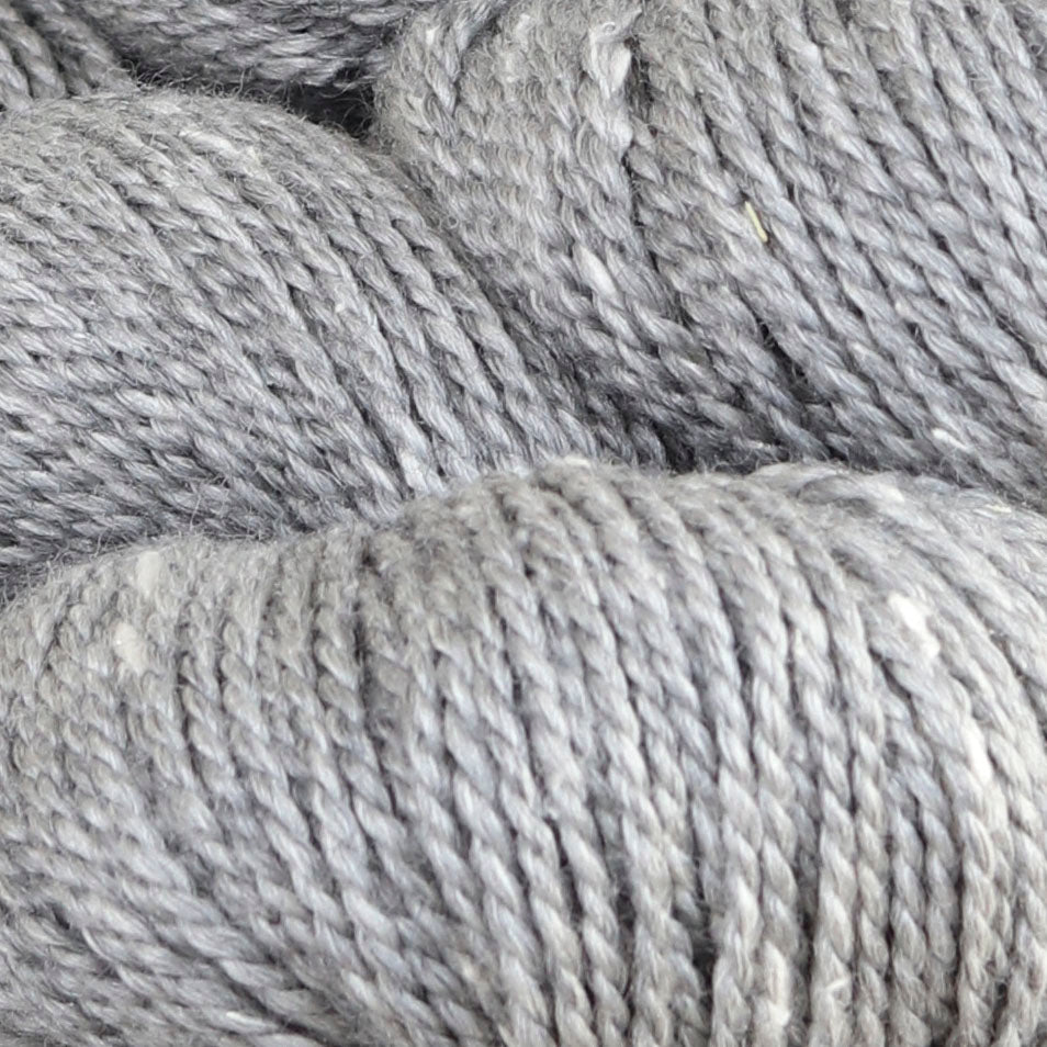 Detail image of The Fibre Co Acadia in Mountain Ash, a heathered light grey with white.