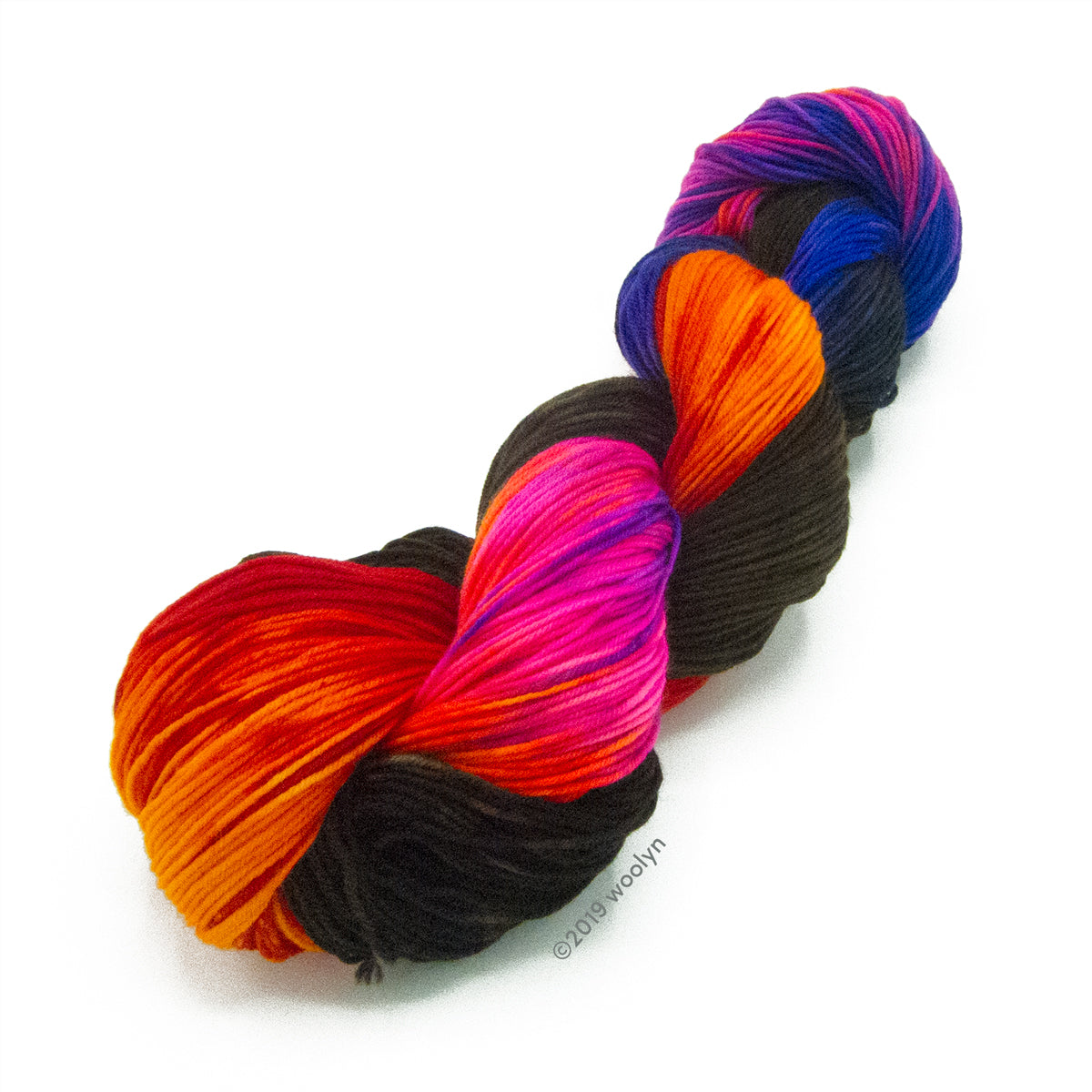 Knitted Wit Sock Shut the Fucupcakes a handpainted varigated rainbow of brown, red, orange, purple and blue.
