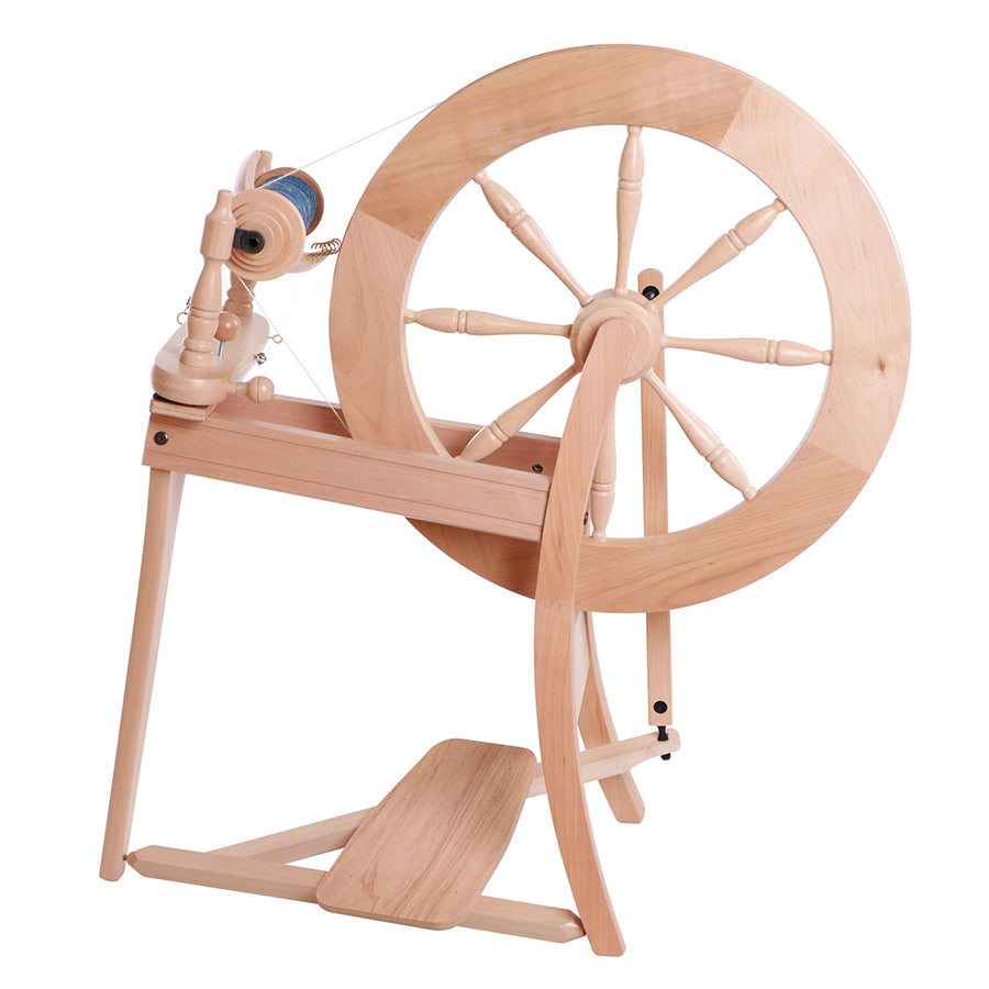 Front view of the Ashford Traditional Spinning wheel with a single treadle. 