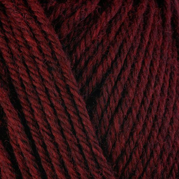 Detail of Berroco Ultra Wool Sour Cherry 33145, a dark heathered brownish red. 