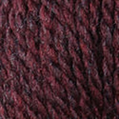 Detail of Blue Sky Woolstok 50g deep velvet, a heathered deep deep maroon. 