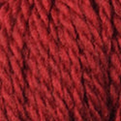 Detail of Blue Sky Woolstok 50g red rock, a dark orangey red. 