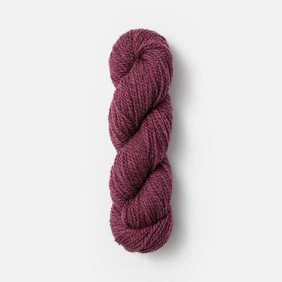Skein of Blue Sky Woolstok 50g in a medium cranberry. 